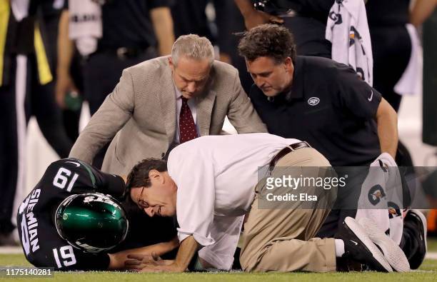 Trevor Siemian of the New York Jets is injured in the second quarter against the Cleveland Browns at MetLife Stadium on September 16, 2019 in East...