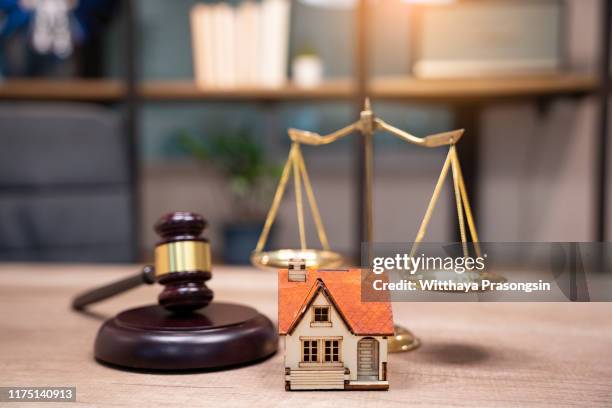 gavel wooden and house for home buying or selling of bidding or lawyer of home real estate and building concept. - house auction stockfoto's en -beelden