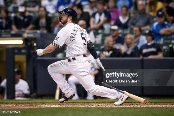 Cory Spangenberg of the Milwaukee Brewers hits a single in the second inning against the San Diego Padres at Miller Park on September 16, 2019 in...