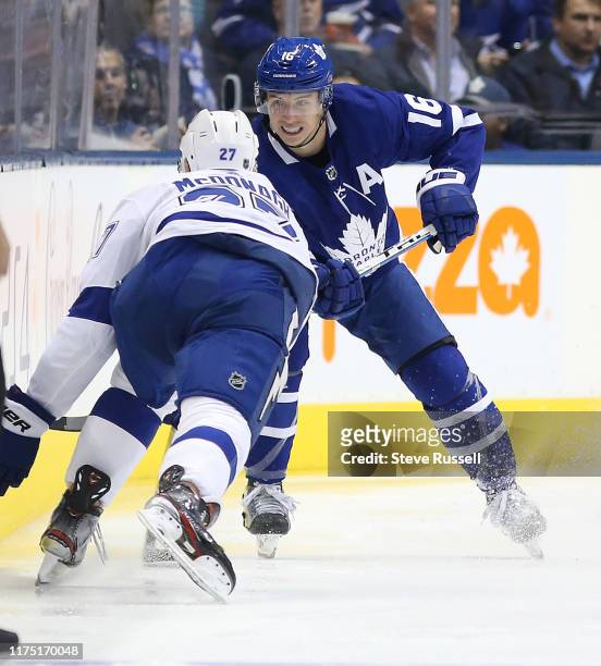 Toronto Maple Leafs center Mitchell Marner plays the puck in front of Tampa Bay Lightning defenseman Ryan McDonagh as the Toronto Maple Leafs lose to...