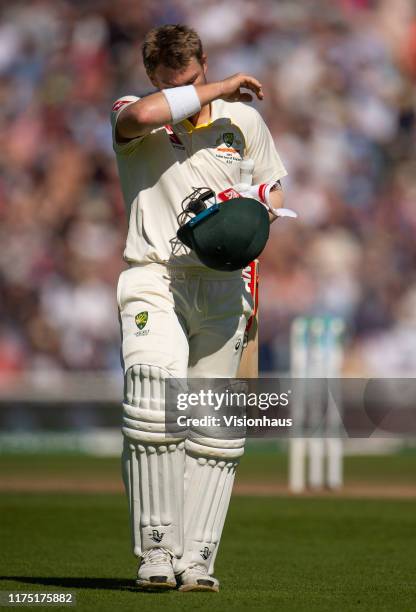 David Warner of Australia walks from the pitch after losing his wicket to Stuart Broad of England during day four of the 5th Specsavers Ashes Test...