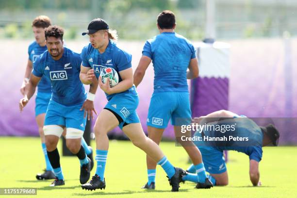 Jack Goodhue of the All Blacks runs through drills during a New Zealand All Blacks Rugby World Cup Training Session at Tatsuminomori Seaside Park 2...