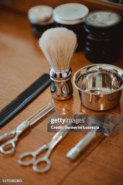 hairdressing and shaving tools on table - shave barber stock pictures, royalty-free photos & images