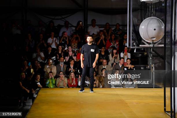 Fashion designer Riccardo Tisci walks the runway at the Burberry Ready to Wear Spring/Summer 2020 fashion show during London Fashion Week September...