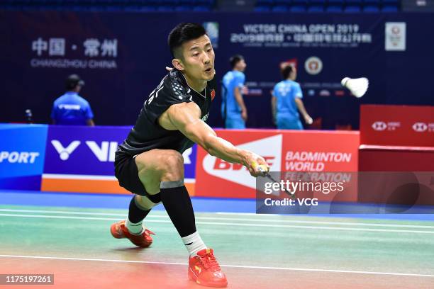 Chen Long of China competes in the Men's Singles first round match against Lee Zii Jia of Malaysia on day one of 2019 China Badminton Open at Olympic...