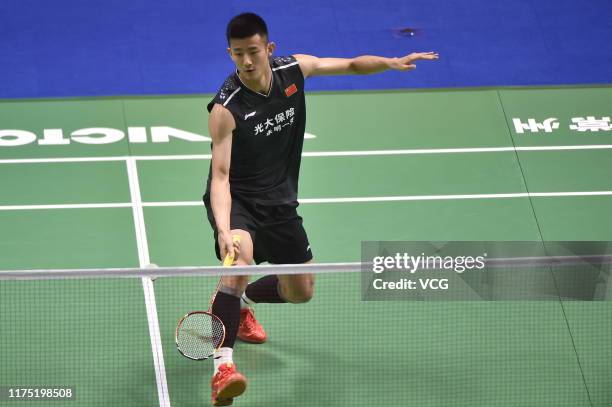 Chen Long of China competes in the Men's Singles first round match against Lee Zii Jia of Malaysia on day one of 2019 China Badminton Open at Olympic...