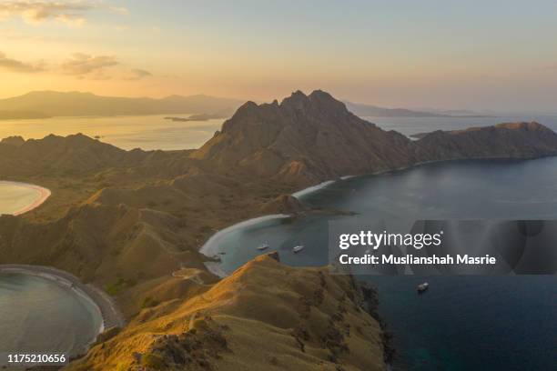 aerial view of padar island at komodo national park during sunset in east nusa tenggara, indonesia. - pulau komodo stock pictures, royalty-free photos & images