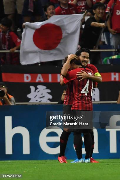 Shinzo Koroki of Urawa Reds celebrates the first goal during the AFC Champions League quarter final second leg match between Urawa Red Diamonds and...
