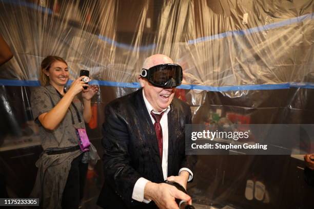Head coach Mike Thibault of the Washington Mystics celebrates in the locker room after winning the 2019 WNBA Finals against the Connecticut Sun...