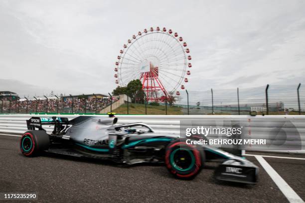 Mercedes' Finnish driver Valtteri Bottas drives during the first practice session for the Formula One Japanese Grand Prix in Suzuka on October 11,...