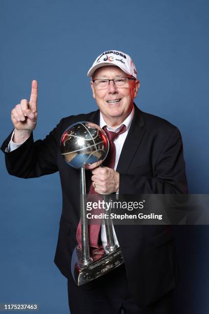 Head coach Mike Thibault of the Washington Mystics smiles with the trophy after winning Game Five of the 2019 WNBA Finals on October 10, 2019 at the...
