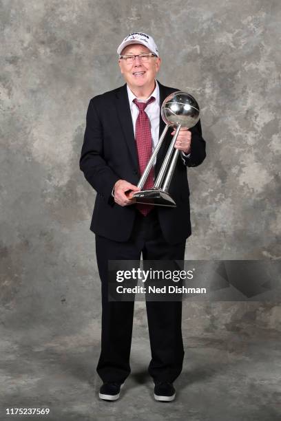 Head Coach Mike Thibault of the Washington Mystics poses for a portrait with the WNBA Championship Trophy after Game Five of the 2019 WNBA Finals on...