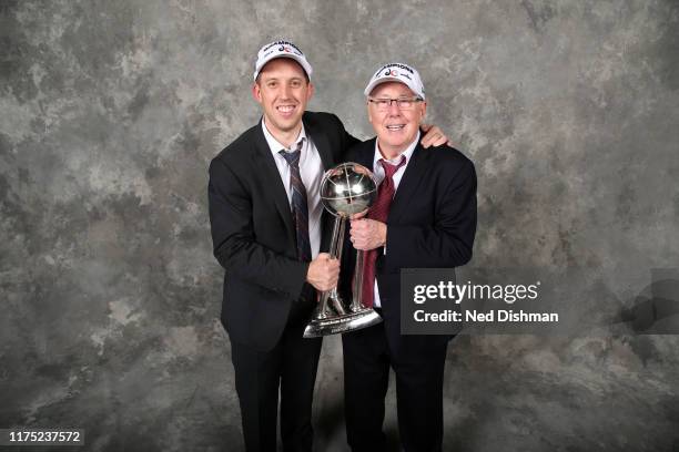 Assistant Coach Eric Thibault and Head Coach Mike Thibault of the Washington Mystics pose for a portrait with the WNBA Championship Trophy after Game...