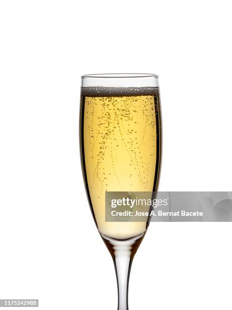 a glass of champagne on a white background. - champagnekleurig stockfoto's en -beelden