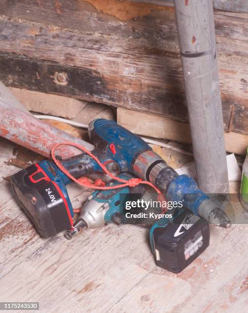 battery powered rechargeable 18v electric drill and 18v torque wrench - torque wrench stock pictures, royalty-free photos & images