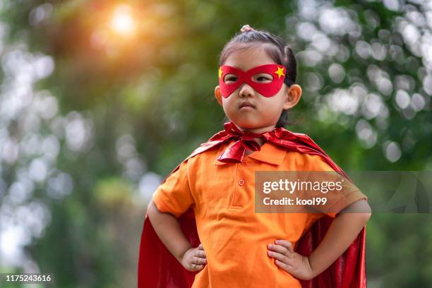 zorro girl - superman stock pictures, royalty-free photos & images