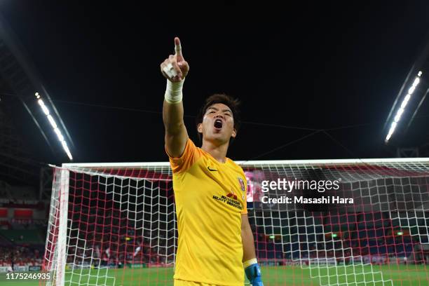 Shusaku Nishikawa of Urawa Reds celebrates the win after the AFC Champions League quarter final second leg match between Urawa Red Diamonds and...