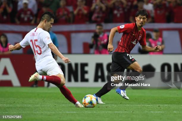 Yuki Abe of Urawa Reds in action during the AFC Champions League quarter final second leg match between Urawa Red Diamonds and Shanghai SIPG at...