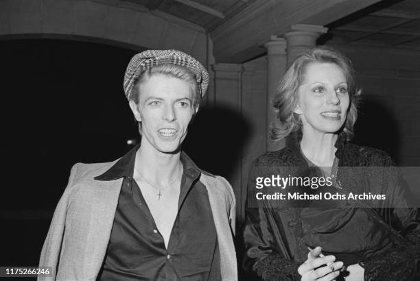 David Bowie and hs wife Angie, at a reception given by the American Film Institute for film director Michelangelo Antonioni at Greystone Mansion,...