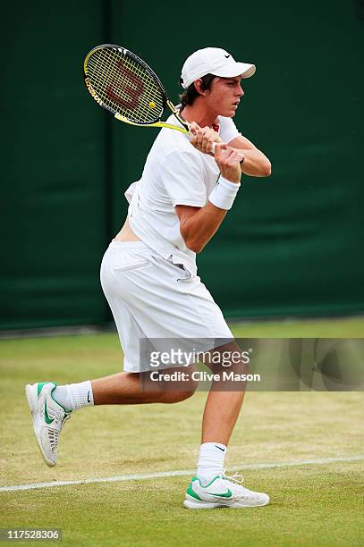 Andrew Whittington of Australia in action during his first round boy's match against Luke Bambridge of Great Britain on Day Seven of the Wimbledon...