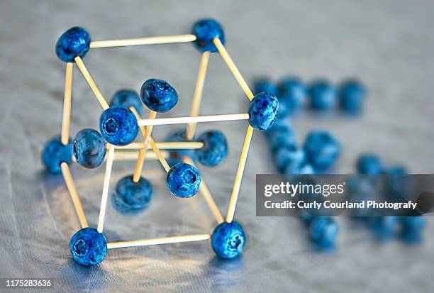 iron molecule made from blueberries - molecular gastronomy stock-fotos und bilder