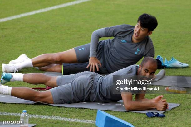 Son Heung-min and Lucas Moura of Tottenham Hotspur are seen during a training session on the day before the UEFA Champions League group B match...