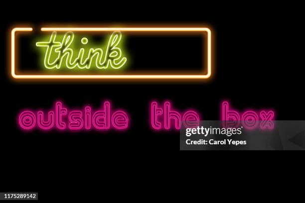 think outside the box text in neon lights - suspicious package stock pictures, royalty-free photos & images