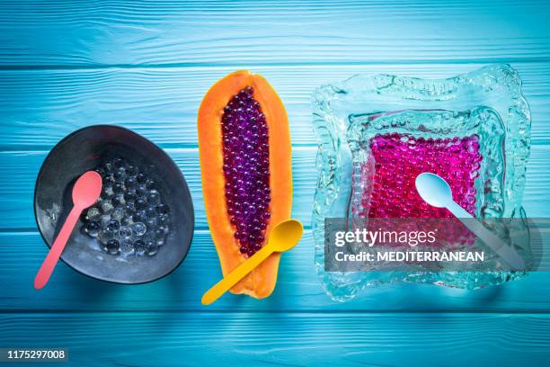 spherification molecular gastronomy concept - gastronomia molecular imagens e fotografias de stock