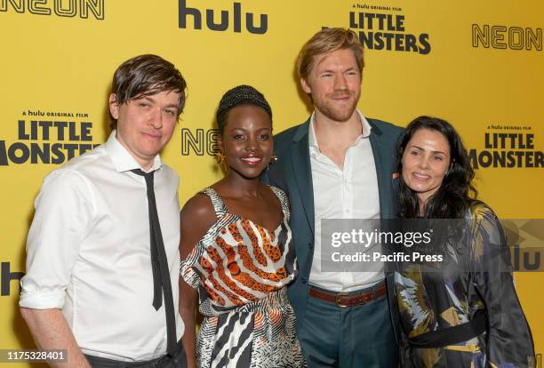 Abe Forsythe, Lupita Nyong'o, Alexander England, Jodi Matterson attend premiere of Hulu original film Little Monsters at AMC Lincoln Square.