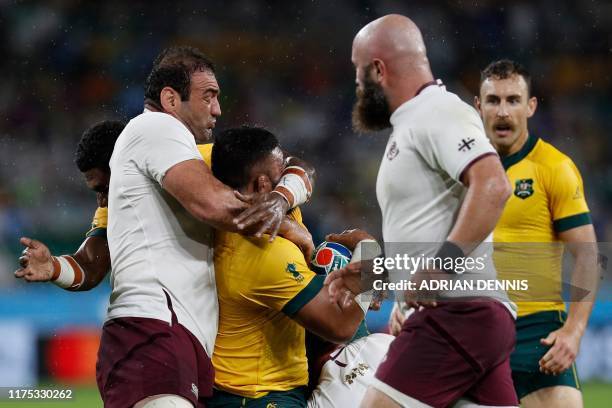 Australia's scrum-half Nic White watches Georgia's flanker Mamuka Gorgodze tackle an Australia player during the Japan 2019 Rugby World Cup Pool D...