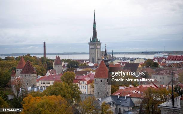 October 2019, Estonia, Tallinn: View to the old town with the medieval city wall and the tower of the Olaikirche , taken from Stenbock House. Photo:...