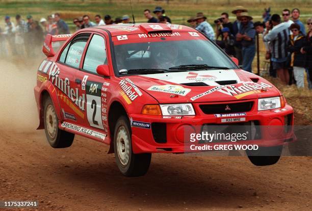 Richard Burns of Great Britain is airborne as he competes during stage three of Rally Australia at Muresk, east of Perth 06 November. Burns and...