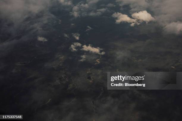 Boreal forest is seen in this aerial photograph taken near Fort McMurray, Alberta, Canada, on Friday, June 14, 2019. Once the booming heart of the...