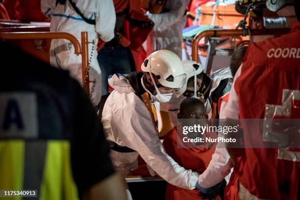 Young rescued boy disembarks at the Malaga's harbour, in Malaga, southern of Spain, on October 9, 2019.