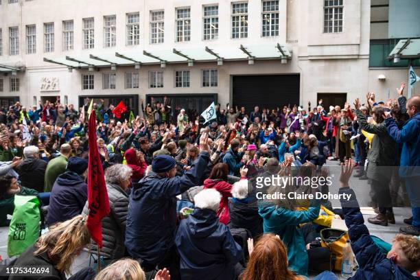 Climate activists from Exctinction Rebellion occupy the forecourt of BBC New Broadcasting House during day five of two weeks of planned...
