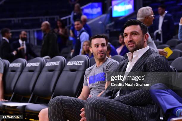 Consultant Zaza Pachulia of the Golden State Warriors sits on the bench before a pre-season game against the Minnesota Timberwolves on October 10,...