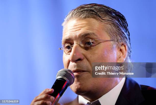 Tunisian presidential candidate, Media mogul Nabil Karoui during a presidential campaign rally on October 11 in avenue Habib-Bourguiba, Tunis, the...