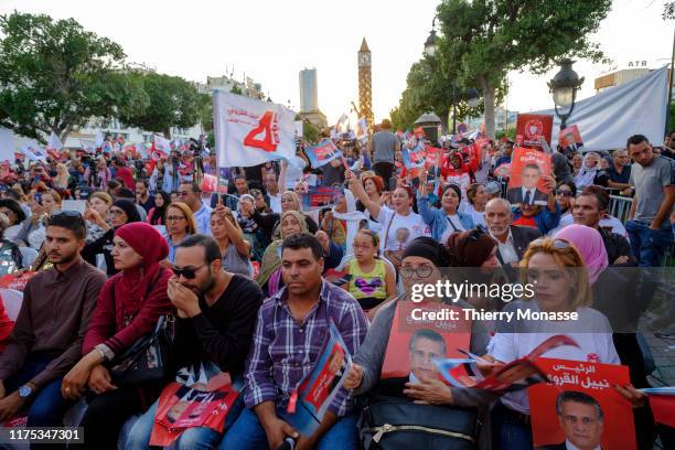 Supporters of the Tunisian presidential candidate, Media mogul Nabil Karoui are waiting for there leaders during a presidential campaign rally on...