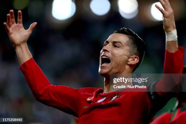 Portugal's forward Cristiano Ronaldo celebrates after scoring a goal during the Euro 2020 qualifier football match between Portugal and Luxembourg at...