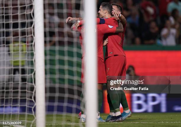 Bernardo Silva of Portugal and Manchester City celebrates with teammates after scoring a goal during the UEFA Euro 2020 Qualifier match between...