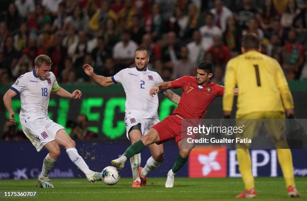 Goncalo Guedes of Portugal and Valencia with Maxime Chanot of Luxembourg and Laurent Jans of Luxembourg in action during the UEFA Euro 2020 Qualifier...