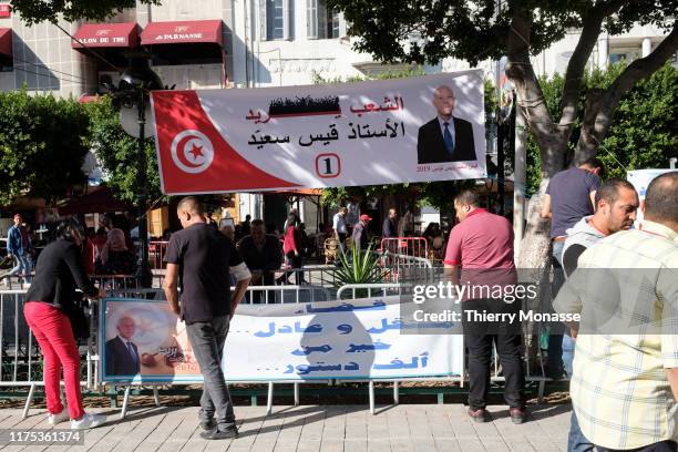 Supporters of the Tunisian presidential candidate, Kais Saied are waiting for there leaders during a presidential campaign rally on October 11 in...