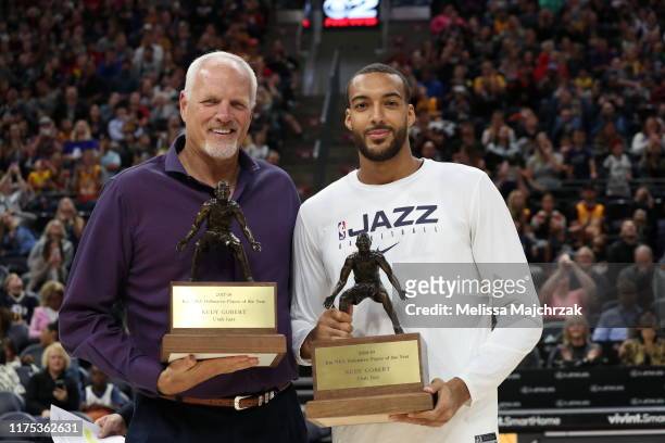 Legend Mark Eaton presents Rudy Gobert of the Utah Jazz 2018-19 KIA NBA Defensive Player of the Year during the meet the team event at...