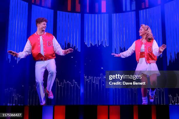 Jay McGuiness and Kimberley Walsh bow at the curtain call during the press night performance of "Big The Musical" at The Dominion Theatre on...