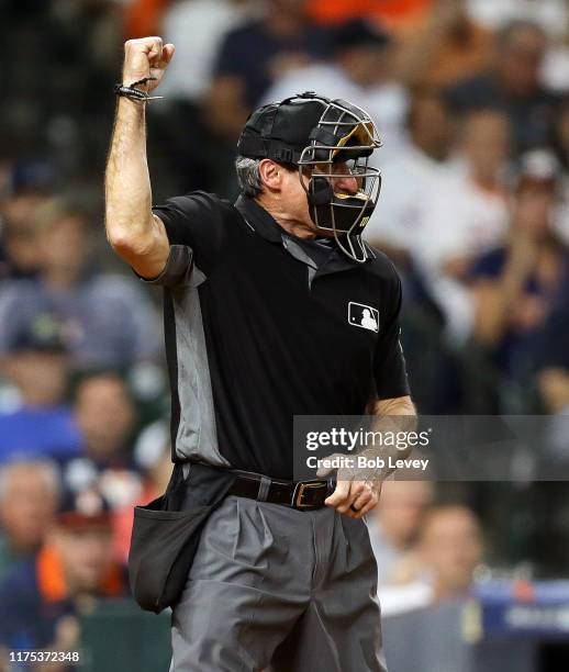 Home plate umpire Angel Hernandez during game action between the Texas Rangers and Houston Astros at Minute Maid Park on September 17, 2019 in...