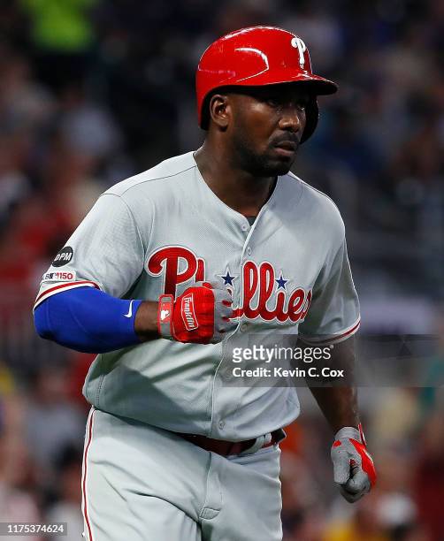 Jose Pirela of the Philadelphia Phillies reacts after hitting a two-run homer in the fourth inning against the Atlanta Braves at SunTrust Park on...