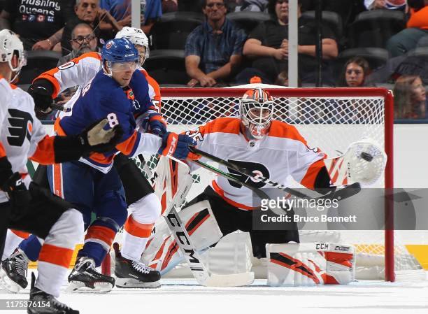 Berube of the Philadelphia Flyers makes the third period save as Steve Bernier of the New York Islanders attempts to deflect the puck at the Nassau...