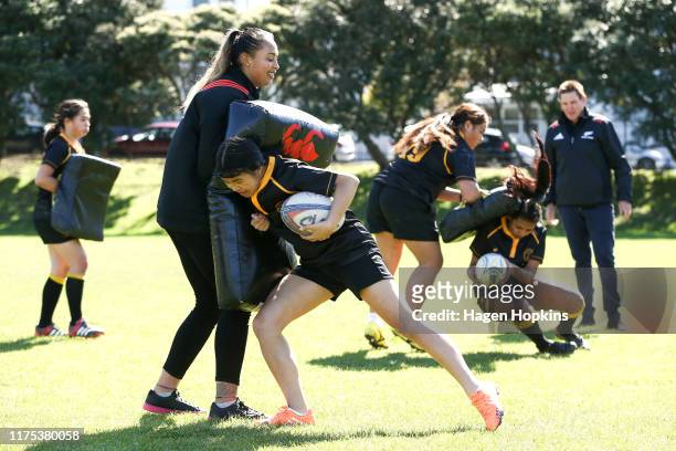 Black Ferns lock Joanah Ngan-Woo trains with members of the Wellington Girls' College rugby team during the New Zealand Black Ferns media...