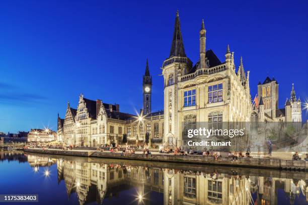 old buildings on the graslei harbour, ghent, belgium - bruges buildings stock pictures, royalty-free photos & images