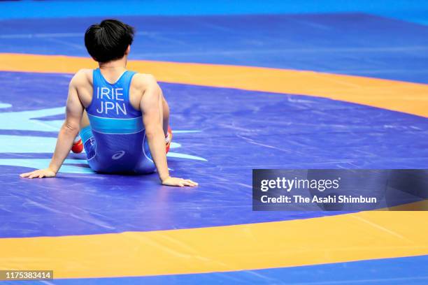 Yuki Irie of Japan shows dejection after her defeat by Yanan Sun of China in the Women's 50kg quarter final on day four of the World Wrestling...
